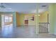 Open concept living room with kitchen and dining area views at 612 Deerwood Ave # 169, Englewood, FL 34223