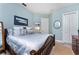 Bright bedroom with king-size bed and ample closet space at 10 Boca Royale Blvd, Englewood, FL 34223