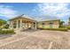 Community clubhouse with covered parking and landscaping at 10300 Coral Landings Ct # 93, Placida, FL 33946