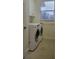 Laundry room with LG washer and dryer and white cabinets at 12 Tee View Ct, Rotonda West, FL 33947