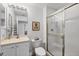 Clean bathroom with shower, toilet and vanity at 13313 Gasparilla Rd # C205, Placida, FL 33946