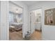View of bedroom and bathroom with tiled floor at 13313 Gasparilla Rd # C205, Placida, FL 33946