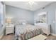 Bright bedroom with a queen-size bed and white dresser at 13313 Gasparilla Rd # C205, Placida, FL 33946