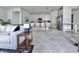 Open concept kitchen featuring barstool seating, stainless steel appliances, and ample counter space at 19060 Moscato Ct, Venice, FL 34293