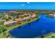 Community overview with lake and houses at 2685 Wax Myrtle Ct, Port Charlotte, FL 33953