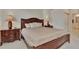 Main bedroom with king-size bed and ensuite bathroom access at 2803 Sawgrass Ct, Port Charlotte, FL 33953