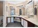 Bathroom with a double sink vanity, large mirrors, and recessed lighting at 514 Pine Hollow Cir # 514, Englewood, FL 34223