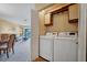 Convenient laundry area with modern washer and dryer at 514 Pine Hollow Cir # 514, Englewood, FL 34223