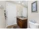 Cozy bathroom includes granite countertop, modern fixtures, and well-lit space for daily routines at 849 Rotonda Cir, Rotonda West, FL 33947