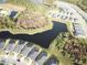 Aerial view showing a neighborhood with houses surrounding a pond at 19060 Moscato Ct, Venice, FL 34293