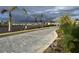 Paved road and landscaping at community entrance at 19060 Moscato Ct, Venice, FL 34293