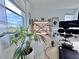 Home office features a standing desk and storage shelving at 19060 Moscato Ct, Venice, FL 34293