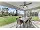 Relaxing screened porch with outdoor dining set at 2775 Wyola Ave, North Port, FL 34286