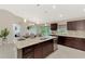 Modern kitchen with large island and breakfast bar at 2775 Wyola Ave, North Port, FL 34286