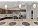 Spacious kitchen with granite countertops and stainless steel appliances at 2775 Wyola Ave, North Port, FL 34286