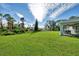Spacious backyard with lush lawn and view at 2775 Wyola Ave, North Port, FL 34286