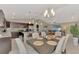 Eat-in kitchen with granite countertops, dark cabinetry, and stainless steel appliances at 2775 Wyola Ave, North Port, FL 34286