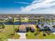 Aerial view highlighting the property's canal-front location at 849 Rotonda Cir, Rotonda West, FL 33947