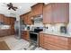 Well-equipped kitchen featuring ample cabinetry and granite countertops at 849 Rotonda Cir, Rotonda West, FL 33947