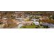 Aerial view of residential neighborhood showcasing various homes and landscape at 976 Euclid Rd, Venice, FL 34293