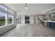 Open concept living room, kitchen, and dining area at 19196 Raymond Ave, Port Charlotte, FL 33954