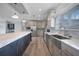 Modern kitchen with stainless steel appliances and large island at 19196 Raymond Ave, Port Charlotte, FL 33954