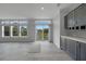 Living area with sliding doors leading to backyard at 19196 Raymond Ave, Port Charlotte, FL 33954