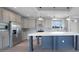 Modern kitchen with stainless steel appliances and large island at 19196 Raymond Ave, Port Charlotte, FL 33954