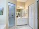 Bathroom features a vanity, shower, and linen closet at 254 Bunker Rd, Rotonda West, FL 33947