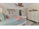 Comfortable bedroom with a queen bed and ample closet space at 264 Park Forest Blvd, Englewood, FL 34223