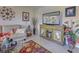 Living Room with a comfy couch and decorative wall art at 19 Quails Run Blvd # 2, Englewood, FL 34223