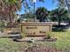 Community entrance sign for Quail's Run at 19 Quails Run Blvd # 2, Englewood, FL 34223