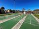 Well-maintained shuffleboard courts for residents' enjoyment at 19 Quails Run Blvd # 2, Englewood, FL 34223