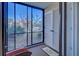 Spacious screened porch with view of the surrounding landscape at 19 Quails Run Blvd # 2, Englewood, FL 34223
