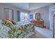 Comfortable bedroom with private access to the balcony at 19 Quails Run Blvd # 2, Englewood, FL 34223