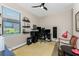 Bright home office with desk, chair, and window at 13077 Rinella St, Venice, FL 34293