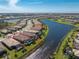 Single-Gathering home situated on a waterfront lot, featuring a private pool at 13077 Rinella St, Venice, FL 34293