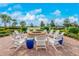 Relaxing fire pit with seating for community gatherings at 13077 Rinella St, Venice, FL 34293