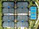 Aerial view of community tennis and pickleball courts at 13077 Rinella St, Venice, FL 34293