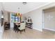 Elegant dining room featuring a gold chandelier and decorative wall art at 13077 Rinella St, Venice, FL 34293