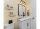 Charming bathroom with a single vanity and updated fixtures at 13077 Rinella St, Venice, FL 34293