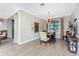 Formal dining room with a rustic-style table and chandelier at 13077 Rinella St, Venice, FL 34293
