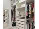 Spacious walk-in closet with ample shelving and hanging space at 13077 Rinella St, Venice, FL 34293