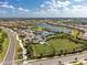 Aerial view of community amenities including pool, tennis, and dog park at 13077 Rinella St, Venice, FL 34293
