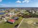 House with solar panels and pool, aerial view at 4130 Cape Haze Dr, Placida, FL 33946