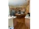 Kitchen with wood cabinets, stainless steel appliances, and an island at 2704 Suncoast Lakes Blvd, Punta Gorda, FL 33980