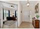 Bright and airy entryway with view into home office at 13104 Creekside Ln, Port Charlotte, FL 33953