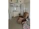 Bedroom with a closet and recliner chair at 26 Quails Run Blvd # 7, Englewood, FL 34223