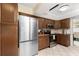 Stainless steel appliances and ample wood cabinetry in this kitchen at 22396 Elmira Blvd, Port Charlotte, FL 33952