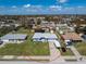 Aerial view of single-Gathering home with pool and large backyard at 22396 Elmira Blvd, Port Charlotte, FL 33952